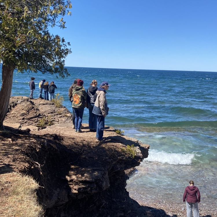 Students standing by Lake Superior