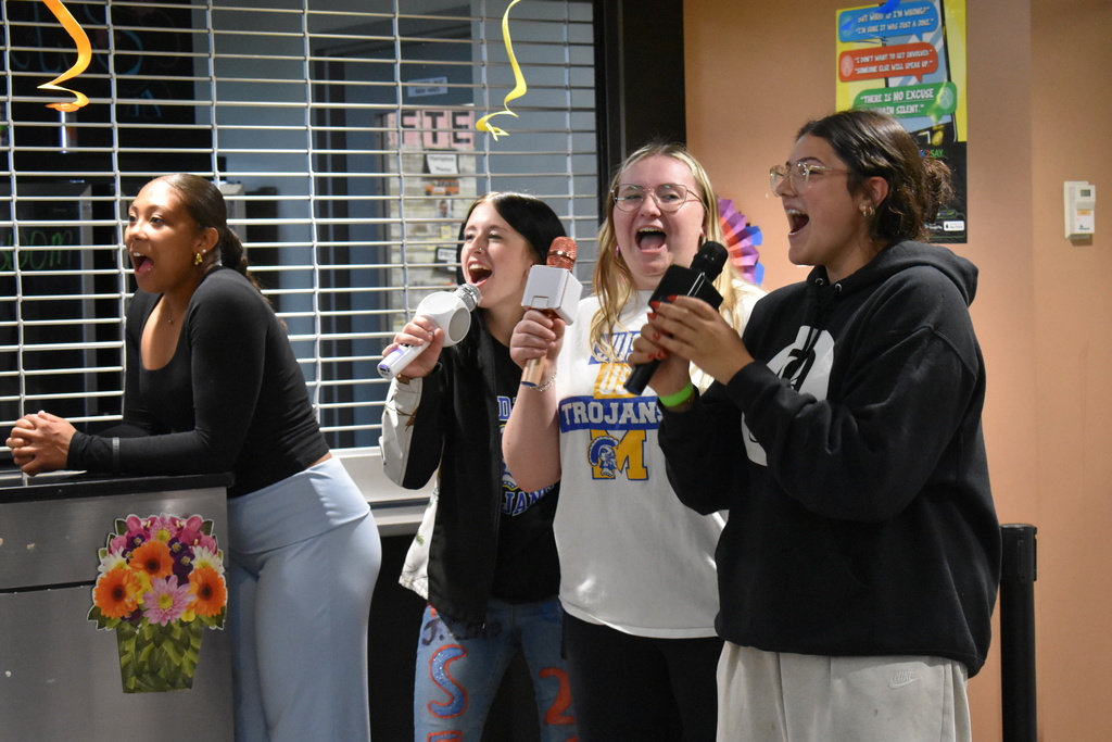 Students singing karaoke
