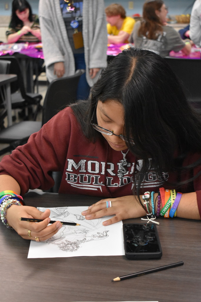 A student drawing a photo