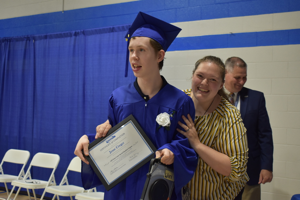 A graduate and his teacher