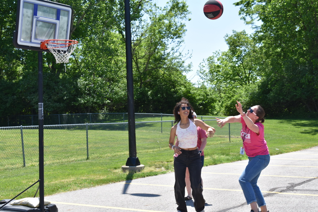A student stuffed a basketball shot of a teacher