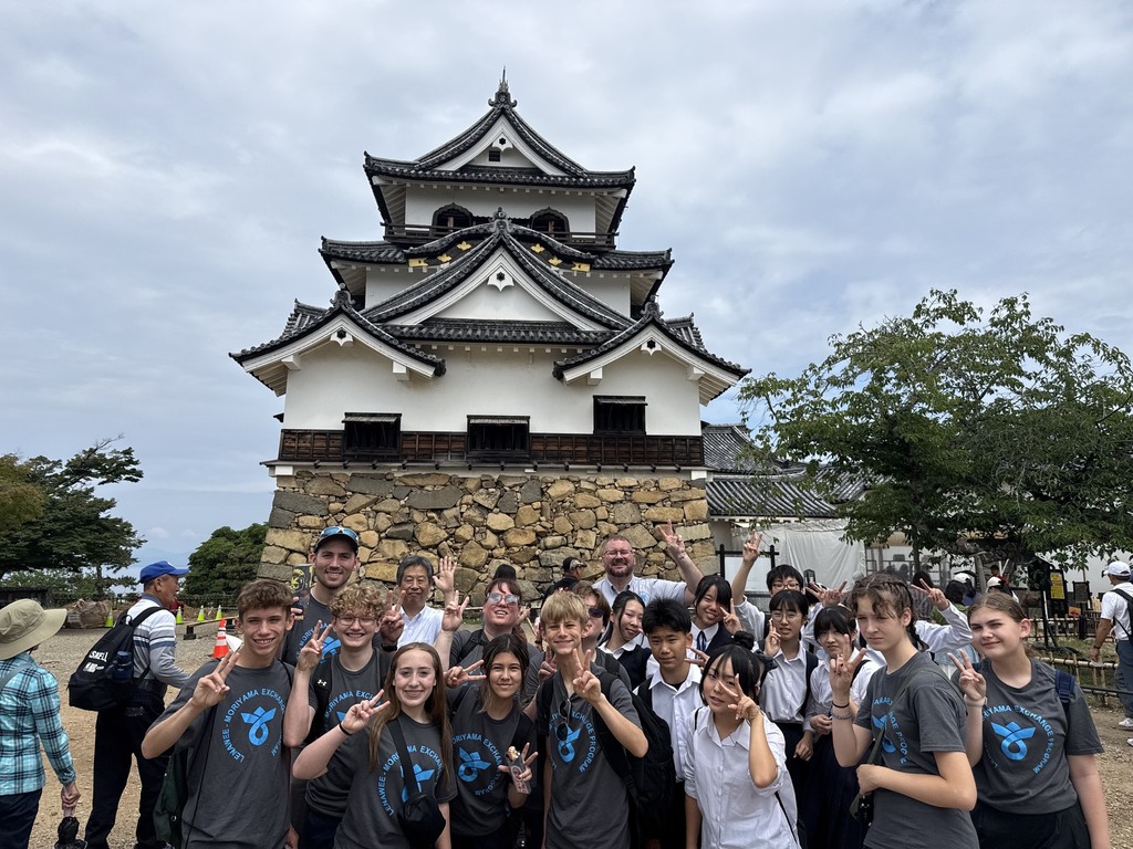 Our Lenawee and Moriyama students posing in front for the Hikone Castle