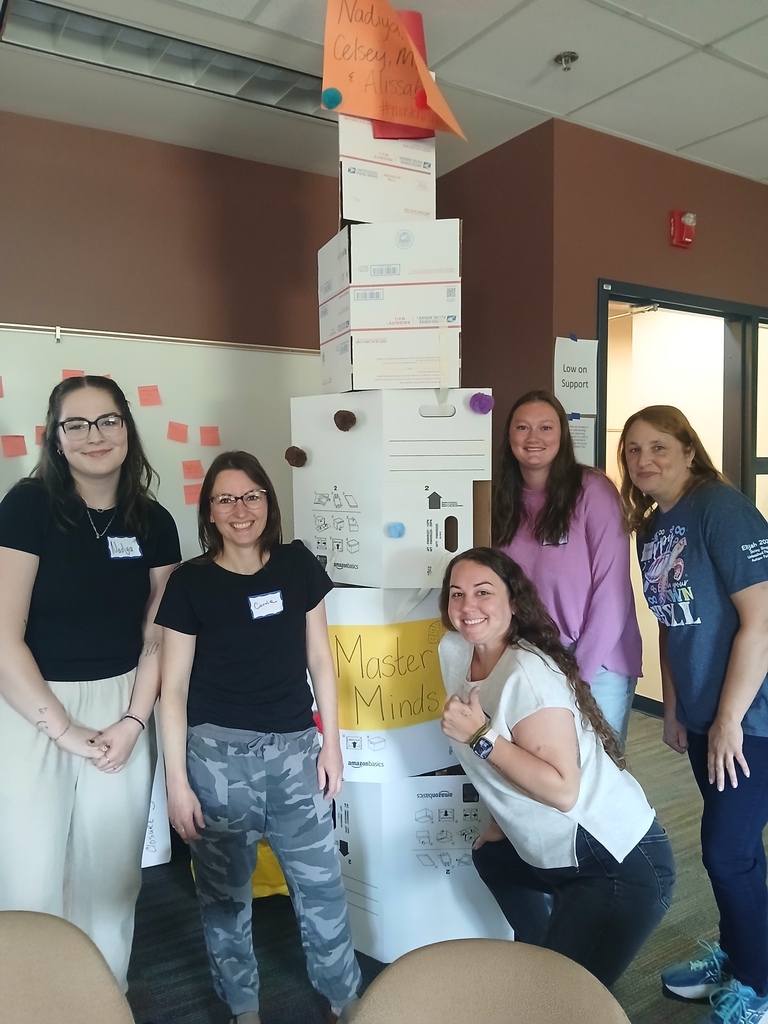Five LISD Employees working on a team building exercise together