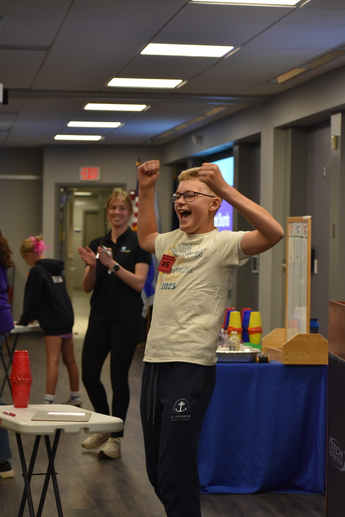 A kid celebrating a win