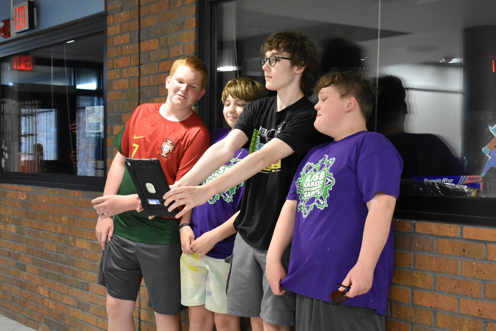 Four students taking a selfie