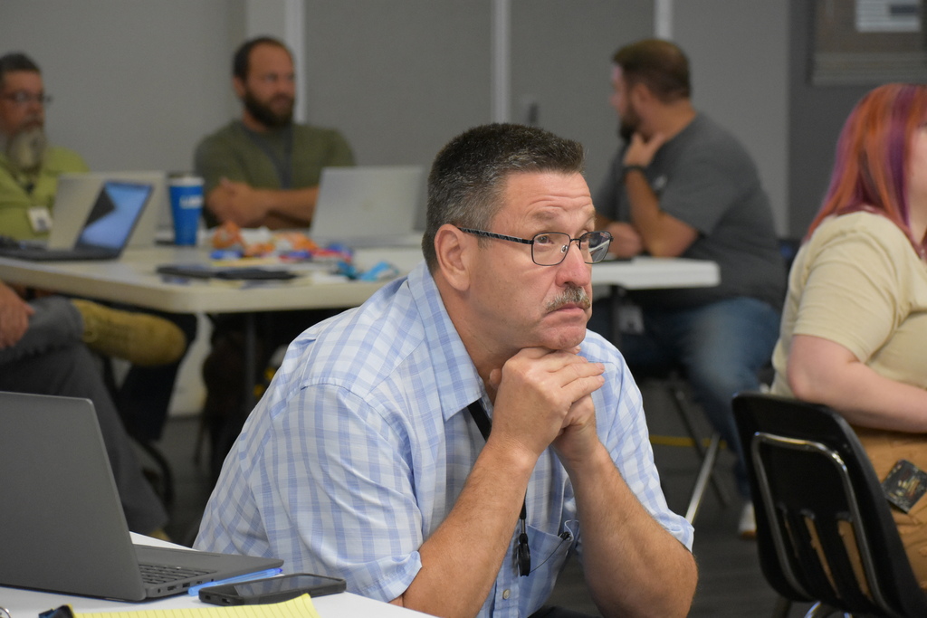 A TECH Center staff member contemplating one of the questions being asked