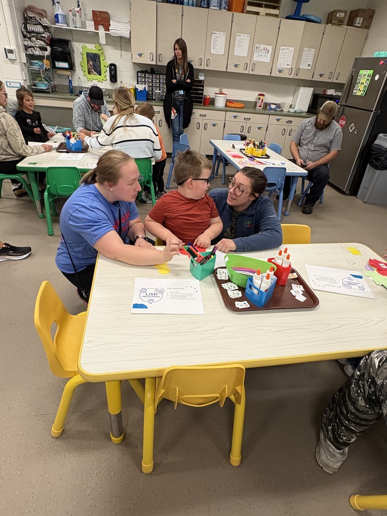 Teacher and student talking about being kind.