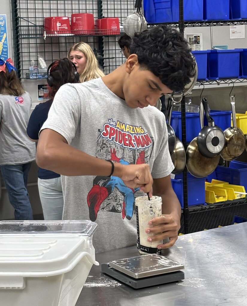 Hospitality student works with yeast creation