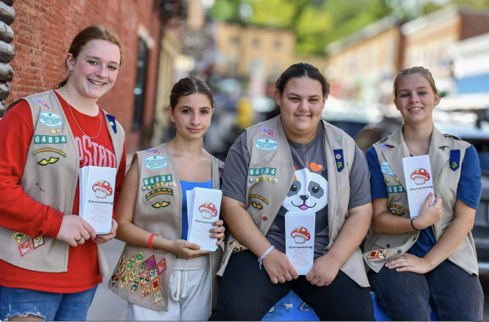 From left, Eva Lovett, Lily Tatro, Serenity Kay and Audrey Hochler of Troop 64834 with their pamphlets on composting. The Girl Scouts earned a Silver Award for their efforts to promote composting.   TROOP 64834