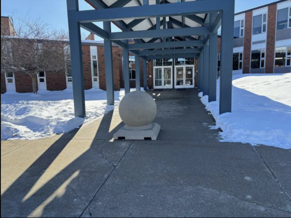 At Lenox Memorial Middle and High School, a security bollard was installed at the main entrance earlier this month as a safeguard to protect accidental damage and injuries and also to block "bad actors" seeking to break into a school by trying to drive into entryways.