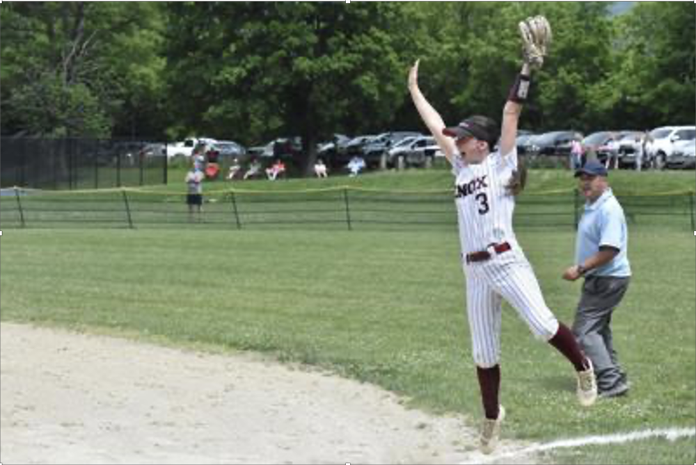 Lilly MacDonald jumps for joy after catching the final out of Lenox's upset win over Hoosac Valley in the MIAA D-V State Tournament Round of 8. 