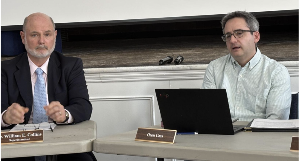 Lenox Schools Superintendent William Collins, left, and School Committee Chairman Oren Cass, seen at the April 13 committee meeting in the Town Hall auditorium. Cass presented the annual evaluation for the superintendent on May 18, with an overall exemplary rating.
