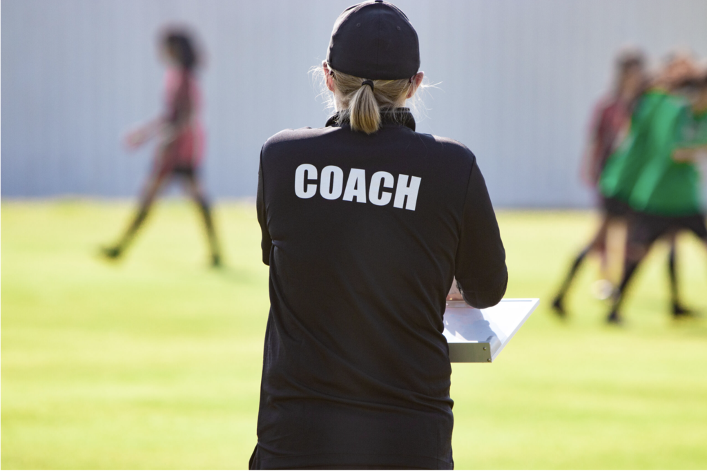 Coach on sidelines