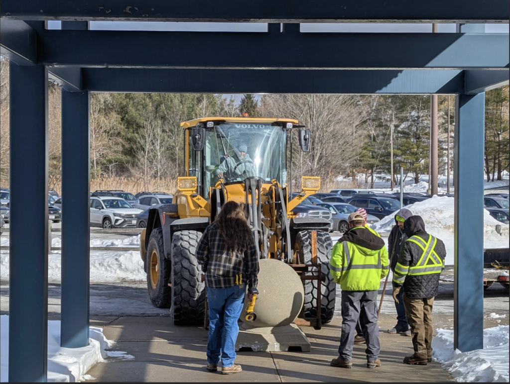 Bollard being placed at LMMHS
