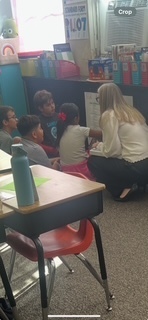 Teachers working with Bluebonnet curriculum.