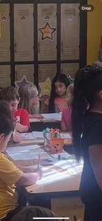 Teachers working with Bluebonnet curriculum.