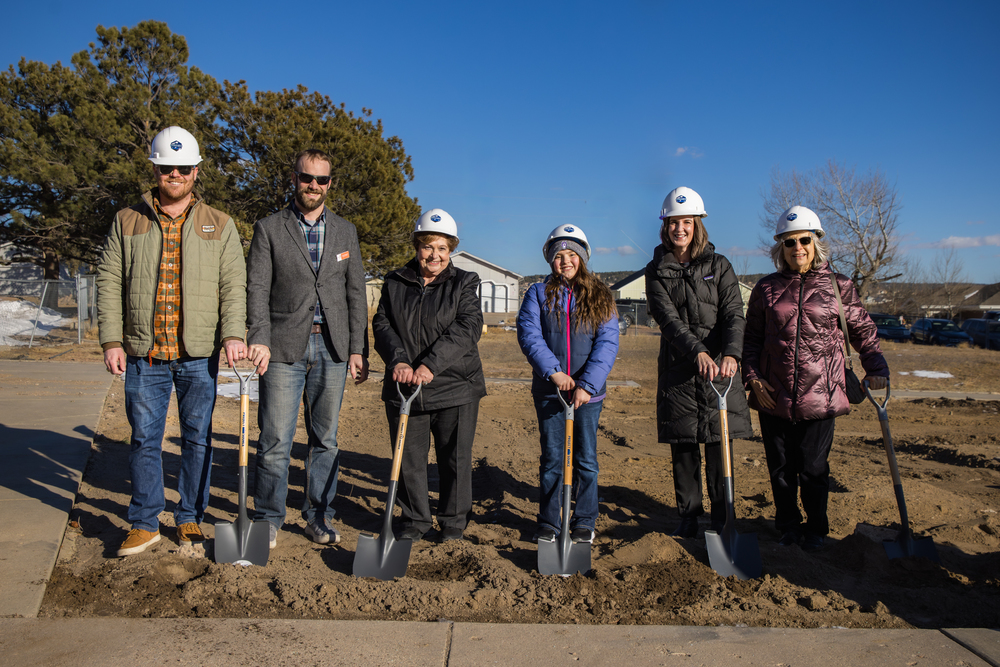 Contractors, HSEA Principal and student, Superintendent Whetstine, and Board of Education V.P. Patti Shank pose with shovels and hard hats