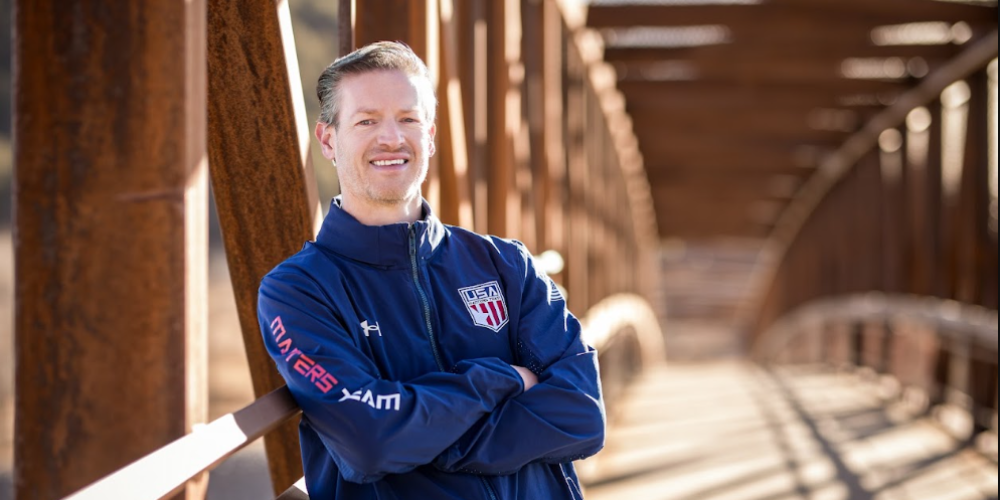 Bret Mischlich posing for a picture on the Palmer Lake Bridge