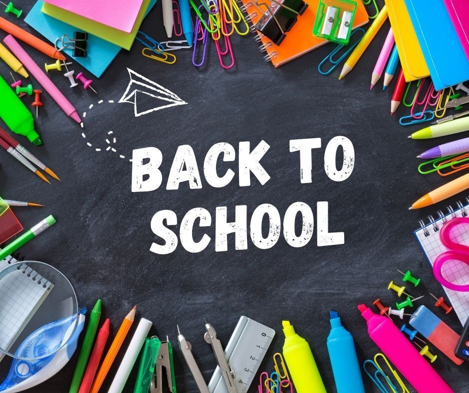 Picture of a chalkboard and school supplies that says back to school