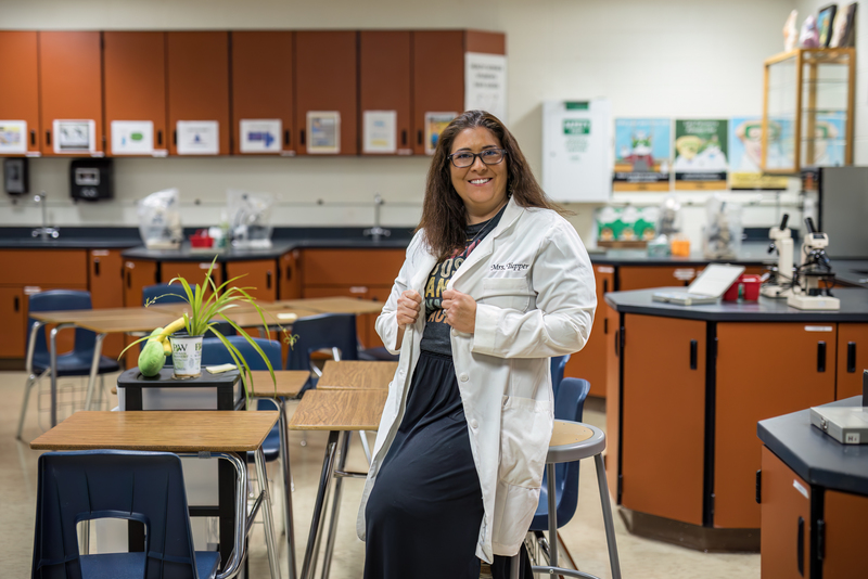 Monica Tupper Poses in her classroom at Lewis-Palmer High School