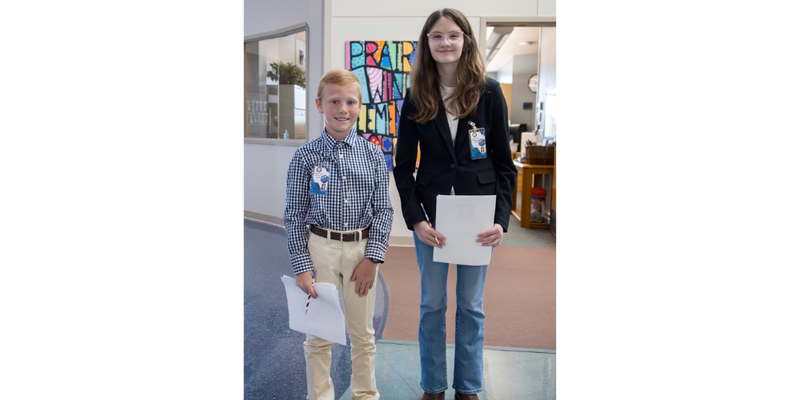 Two students who got to be principal for the day
