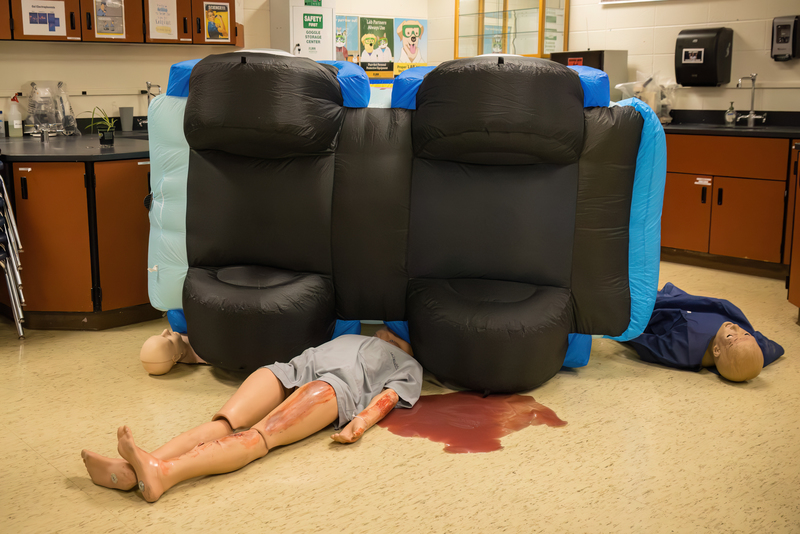 a car crash scenario set up using dummies