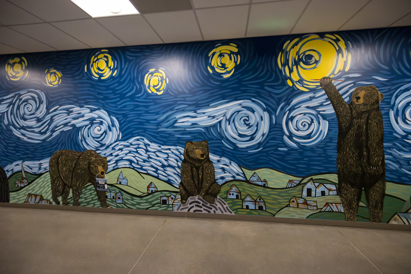Payton's mural on art hall wall with starry night and bears.