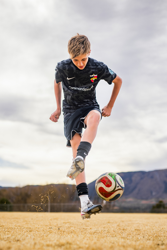 Max juggling a soccer ball