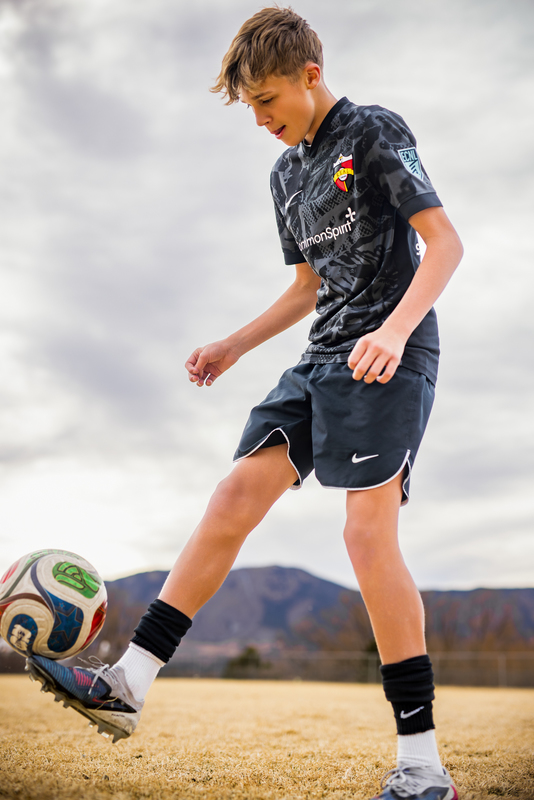 Max juggling a soccer ball