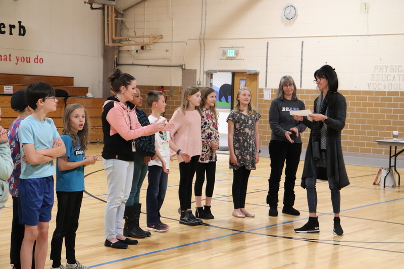 Students lined up in auditorium for tournament