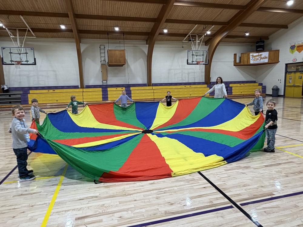 preschoolers with parachute