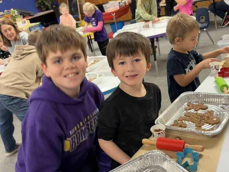 buddies baking gingerbread cookies