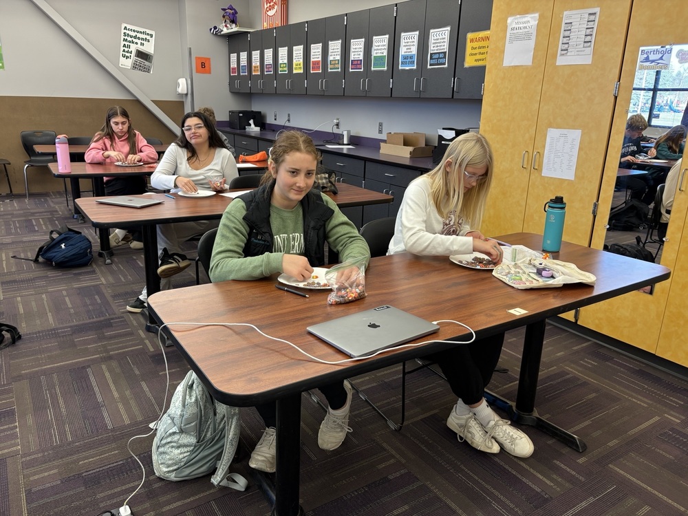 Students sorting Monster cereal.