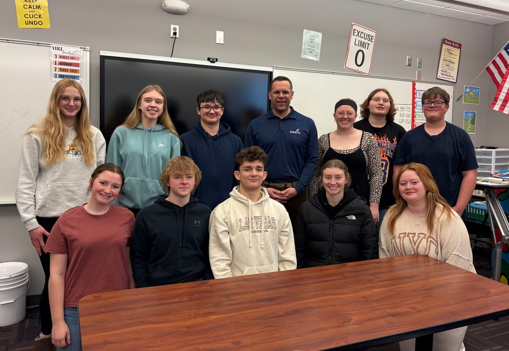 Perry Olson with Financial Literacy students.