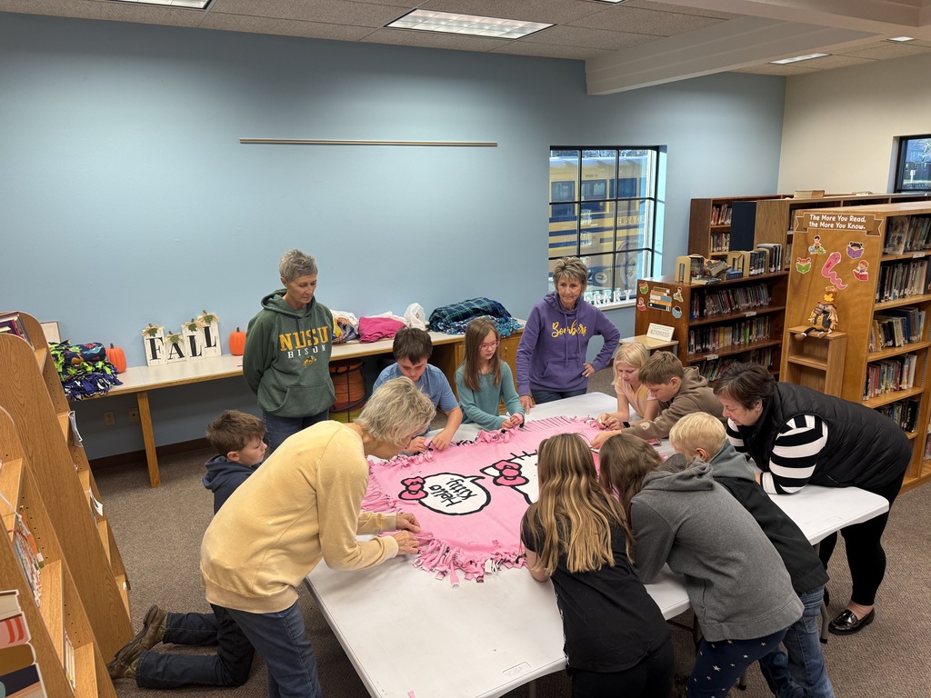 4th Grade Students Making Blankets with Helpers