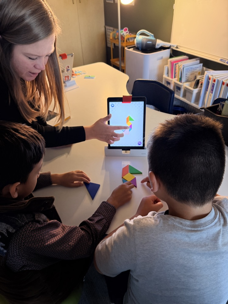 Mrs Erickson teaching the new Osmo program