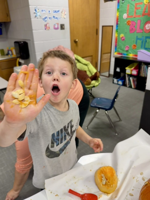 Preschoolers with pumpkins