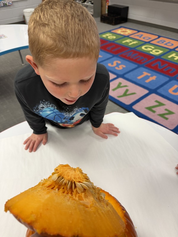 Preschoolers with pumpkins