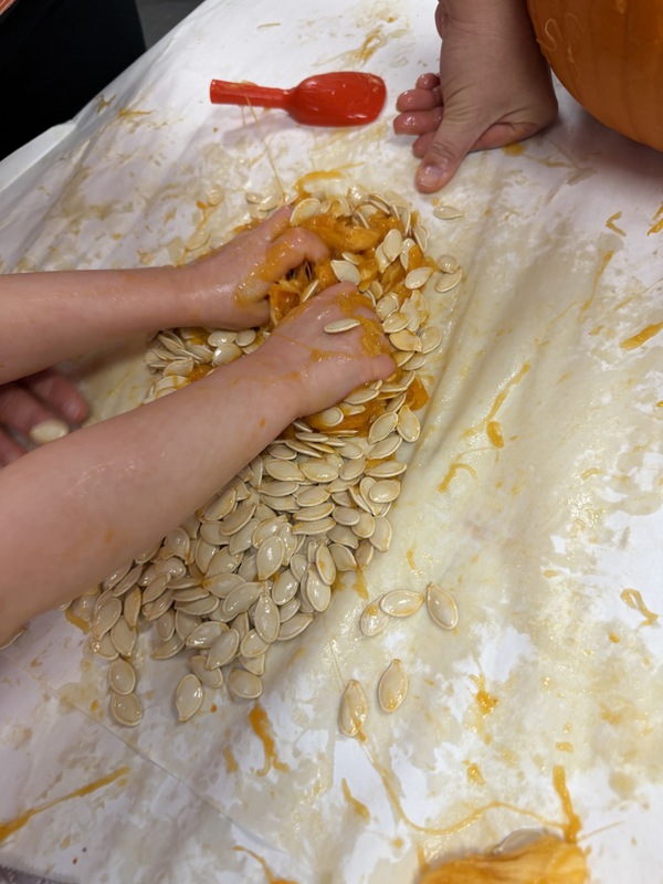 Preschoolers with pumpkins