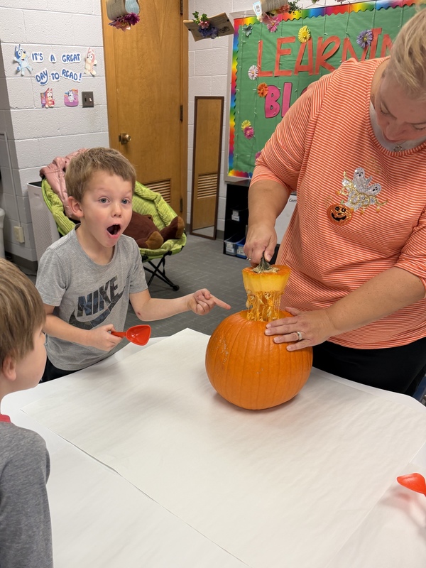 Preschoolers with pumpkins
