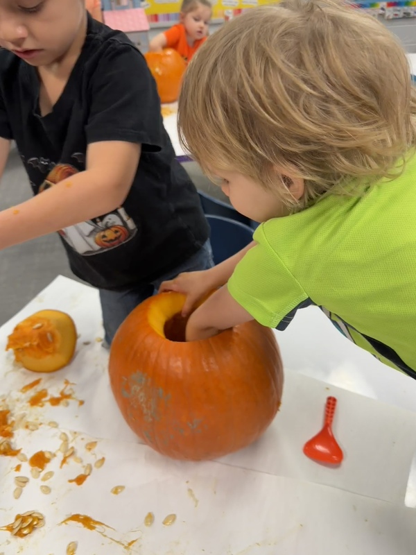 Preschoolers with pumpkins