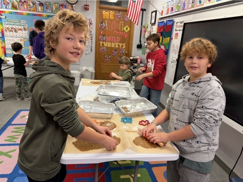 Buddies baking gingerbread cookies 