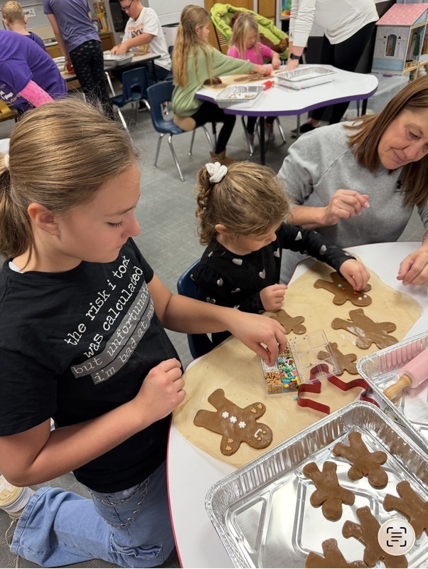 Buddies baking gingerbread cookies 