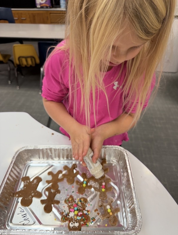 Buddies baking gingerbread cookies 