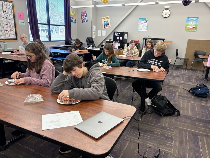 Students sorting Monster cereal.