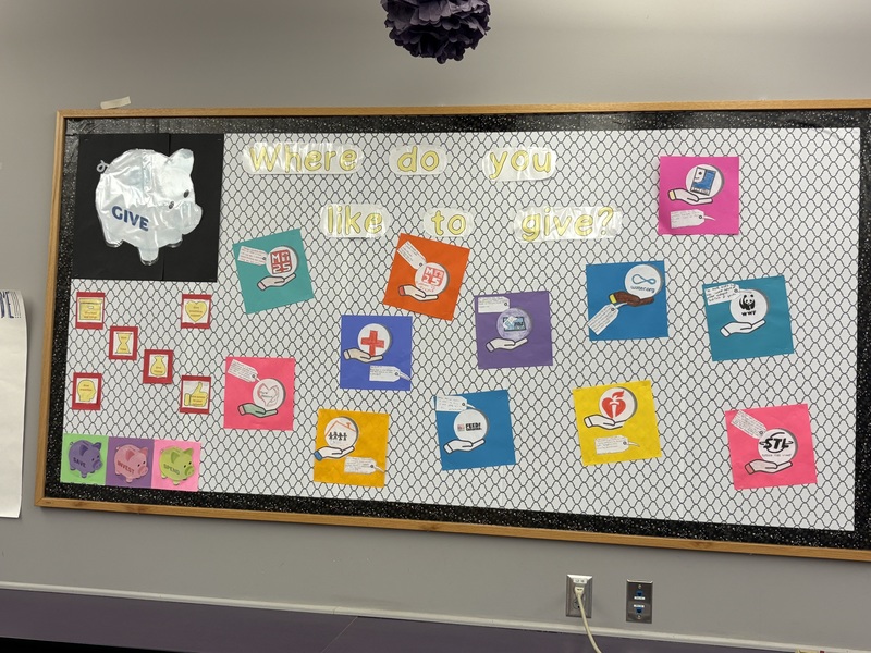 Bulletin board with students' chosen non-profit organizations.