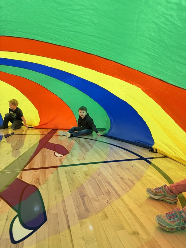 Parachute play with preschoolers