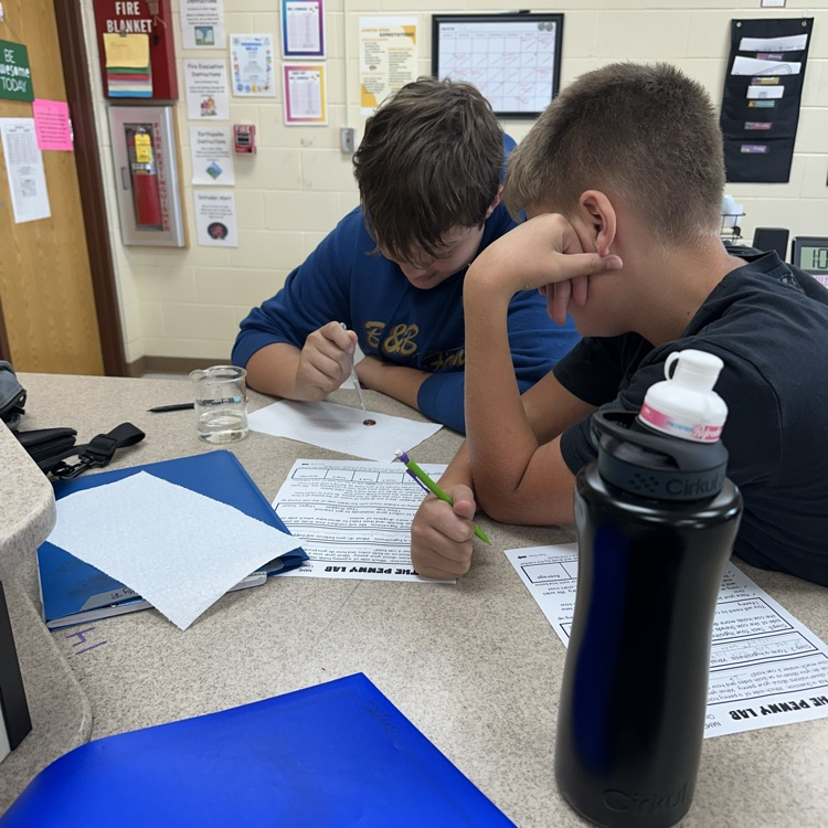 students working on penny lab