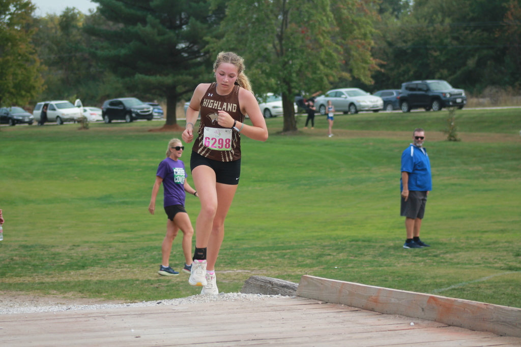 Eva Logsdon crossing a bridge as she heads to the finish at Centralia on Tuesday, October 14.