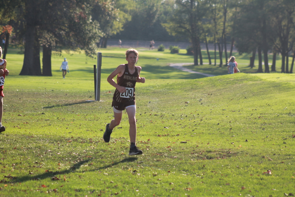 Aiden Martin running his way to another medal (5th place) at the Monroe City Invite on Friday, October 17th.